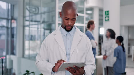 doctor using a tablet in a hospital