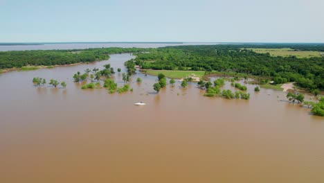 this is an aerial video of flooding on lake texoma. several rain storms in may caused lake texoma to flood.