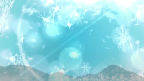 Animation-of-christmas-snow-falling-over-christmas-decorations-on-blue-background