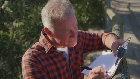 Mature-man-working-on-farm