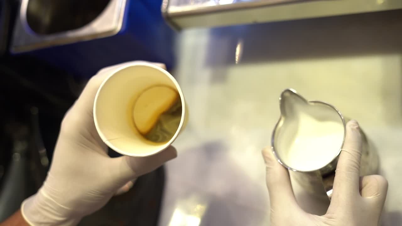 A man prepares his drink, high angle shot, close up shot, insert shot