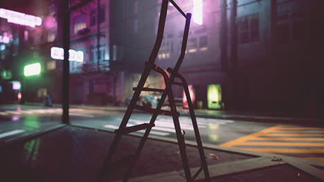 a lone ladder stands on a deserted street in a futuristic city at night