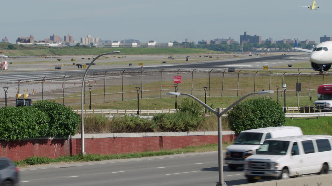 Commercial Jet Crosses Frame while Taxiing Prior to Take-off at NYC's LaGuardia Airport