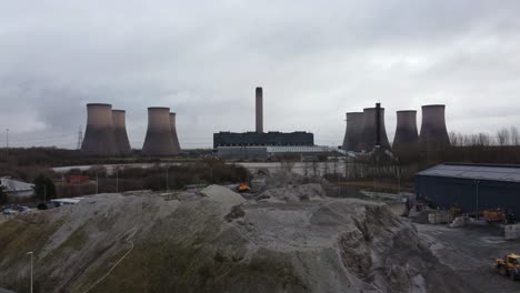 industrial coal fired power station site, aerial view across fiddlers ferry smokestack landmark overcast skyline