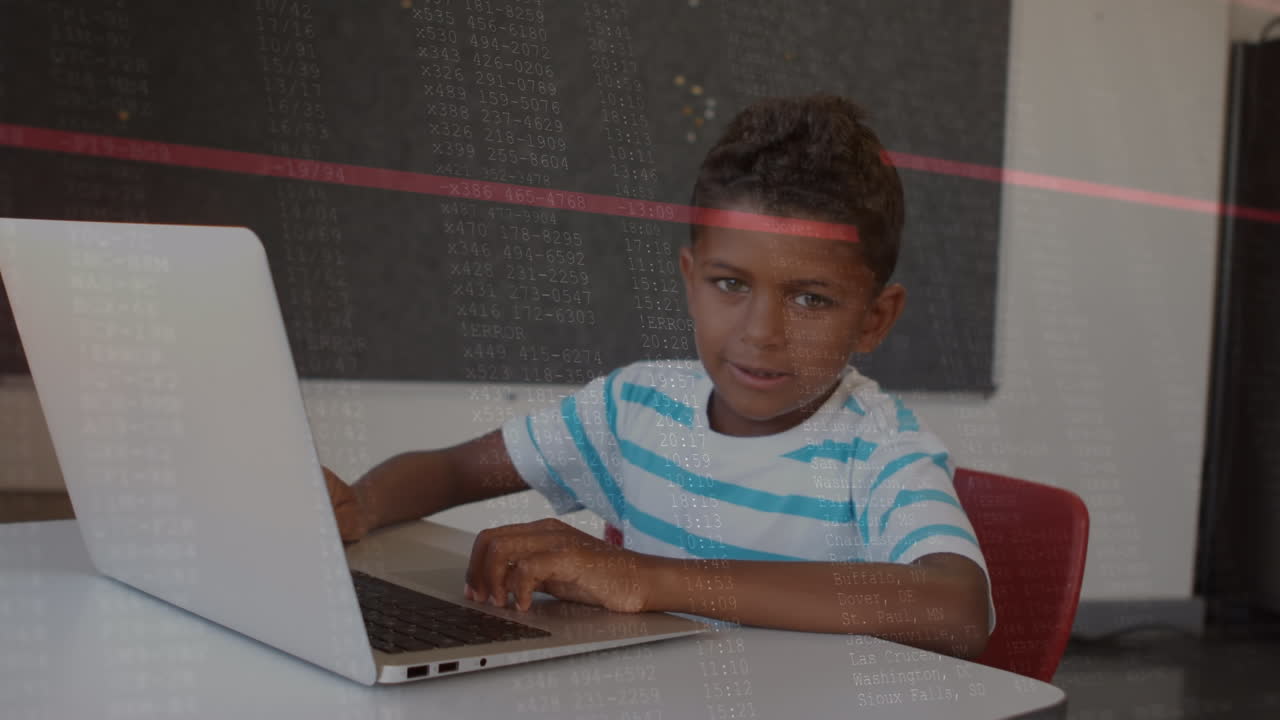 Animation of data processing over african american boy using laptop in the class at school
