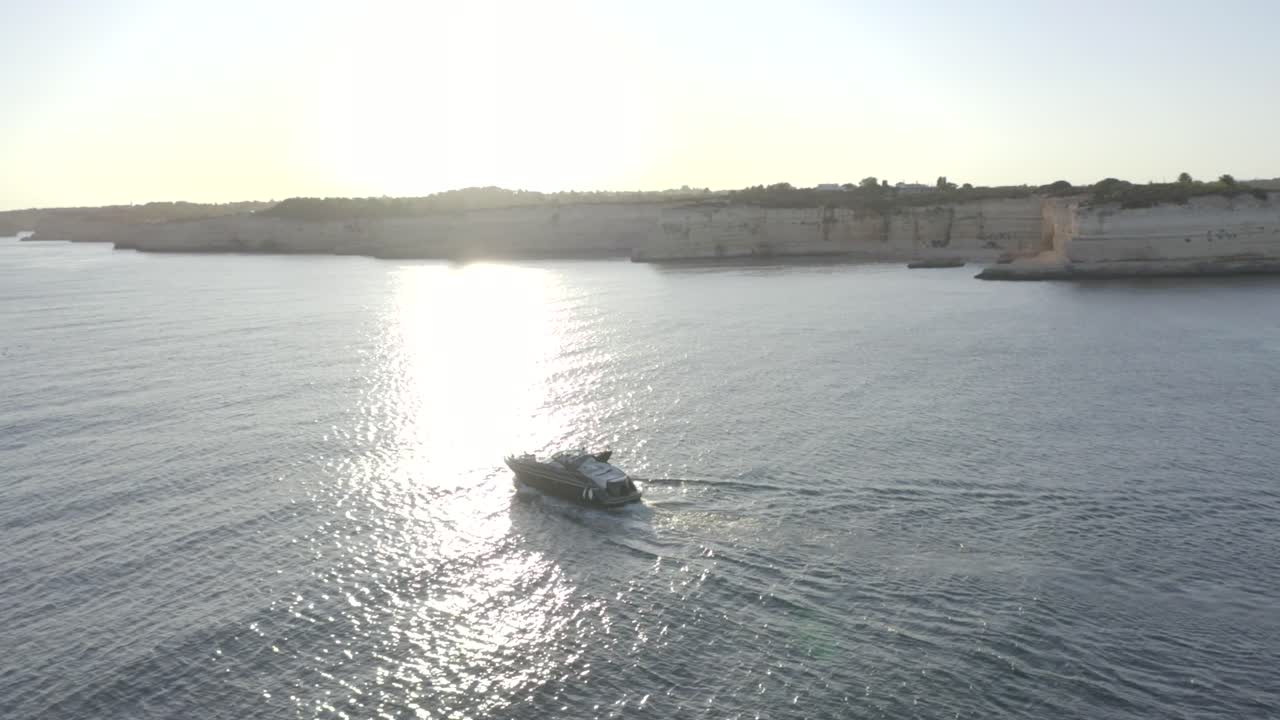 Luxury Yacht Cruising Along the Dramatic Coastline of the Algarve