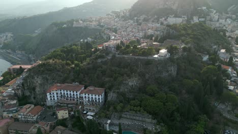 4k aerial of sunset in taormina, sicily, in july 2025
