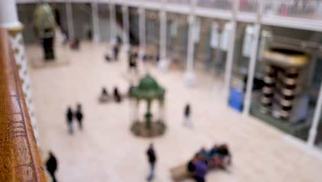 people exploring the museum's main hall