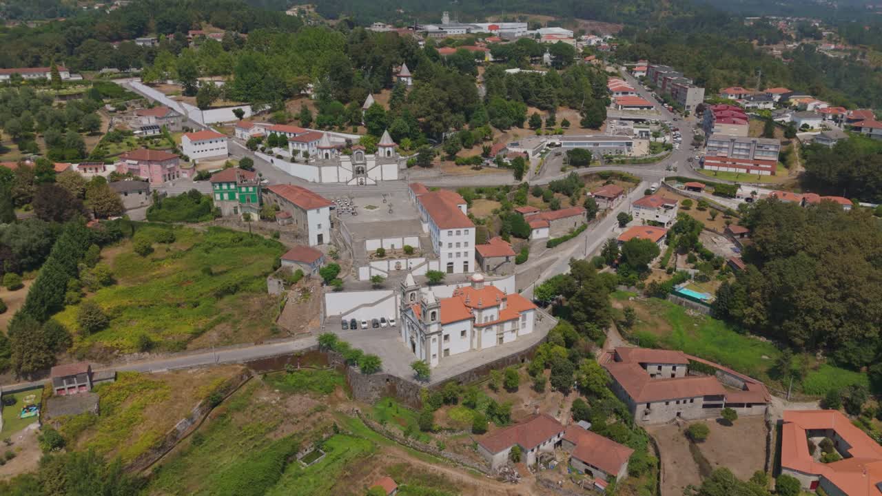 Drone view of Nossa Senhora do Porto de Ave Sanctuary and village in Taíde, Póvoa de Lanhoso, Portugal