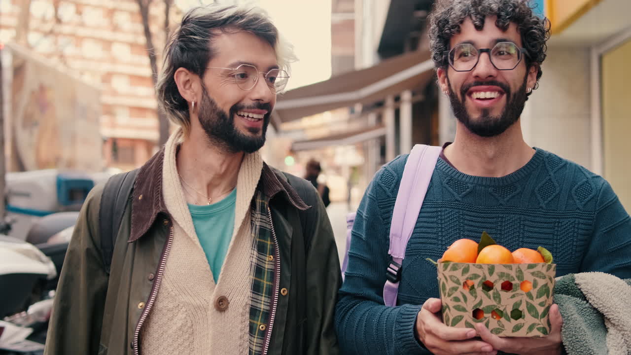 Happy Gay Couple Walking and Talking On The Street
