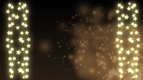 animación de estrellas colgantes y partículas y humo sobre fondo negro