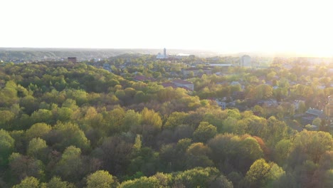 Drone-aerial-view-of-oakwood-park-in-Kaunas,-Lithuania