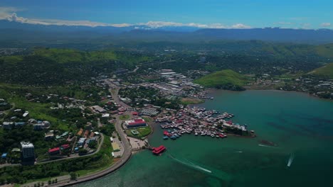 Walter-Bay-Lancha-Rápida-Puerto-Moresby-Papua-Nueva-Guinea-Paralaje-Aéreo-Zumbido-Capital-Ciudad-Puerto-Puerto-Deportivo-Png-Hermosa-Soleado-Cielo-Azul-Mañana-Islas-Ela-Playa-Corona-Hotel-Plaza-Hilton-Coral-Mar-Adelante