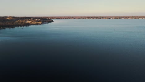 sand docks dune area during an early sunset in winter