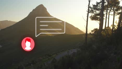 animación de perfil de neón y icono de mensaje contra el paisaje con montañas y bosque.