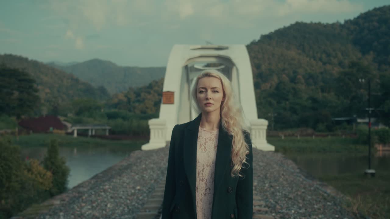 Woman by a Bridge in Nature