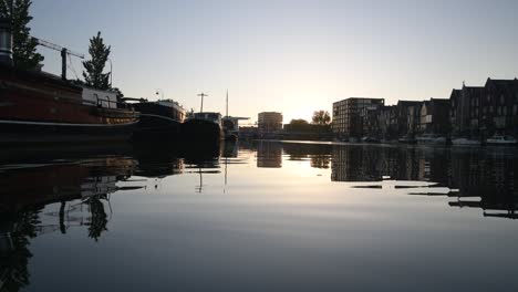 boats and yachts docked along the riverside