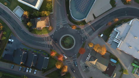 traffic driving at roundabout in friesoythe town in cloppenburg, lower saxony, germany