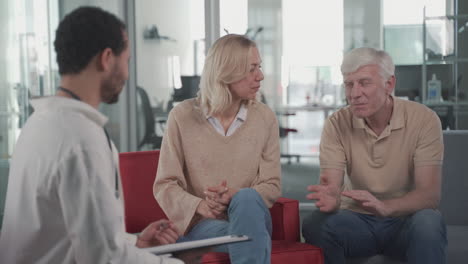 An-Elderly-Couple-Consults-With-A-Young-Black-Doctor