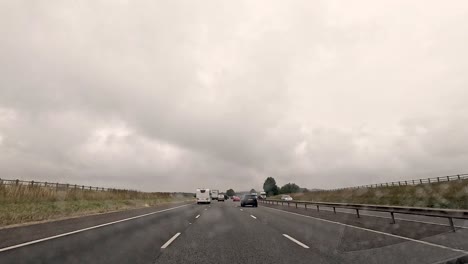 cars traveling on a highway near oxford, england