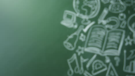 School-subjects-drawn-on-chalkboard-with-space-on-left-pull-to-focus,-shot-on-R3D