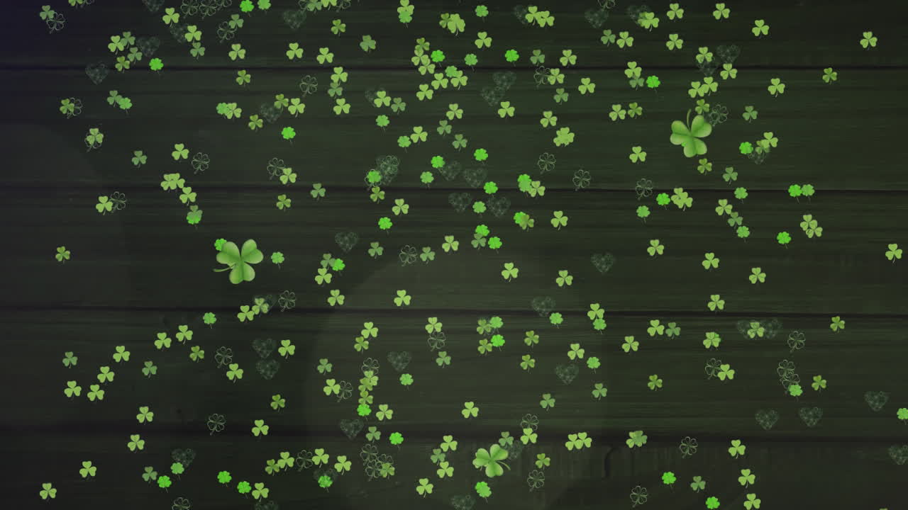 Animation of green clovers falling for St. Patricks day