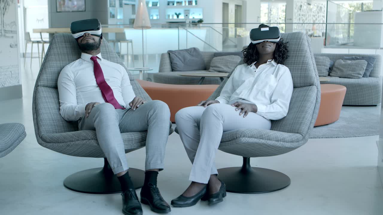 Content colleagues in vr headsets