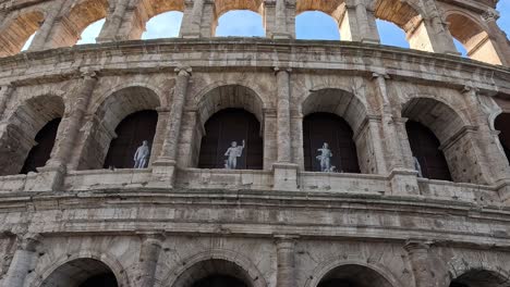 a series of frames showing the colosseum over time