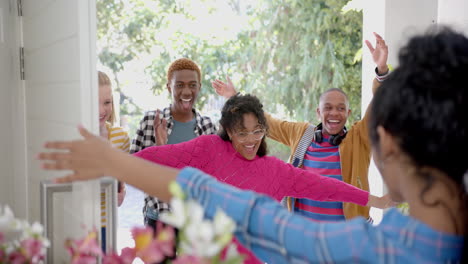 portrait of happy diverse group of teenage friends spending time at home and in park, slow motion