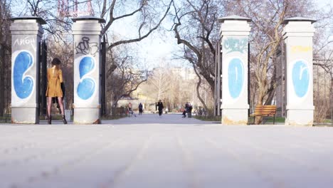 woman in a park entrance