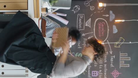 busy office workers in a creative meeting