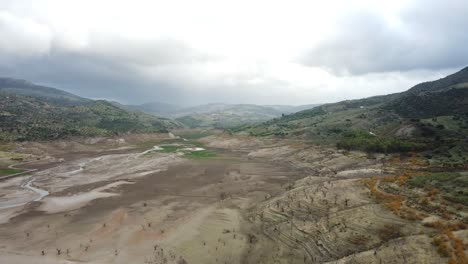 vast marshland in mountain valley in spain, aerial drone view