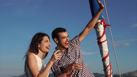 couple celebrating on a yacht