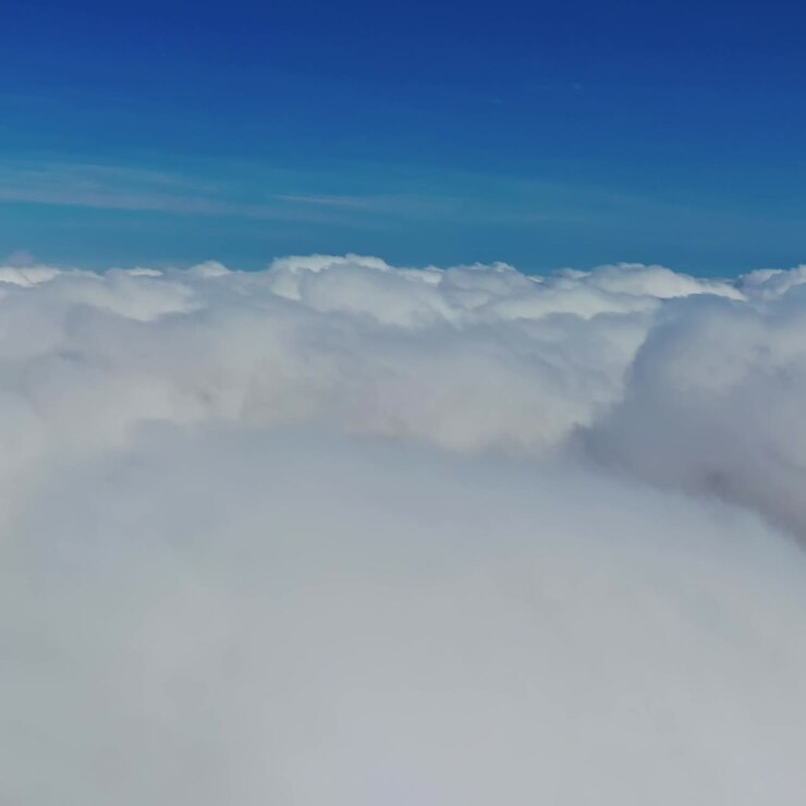 Fluffy white clouds. Fantastic sky landscape. Natural heaven background. Camera moves to the right. Slow motion.