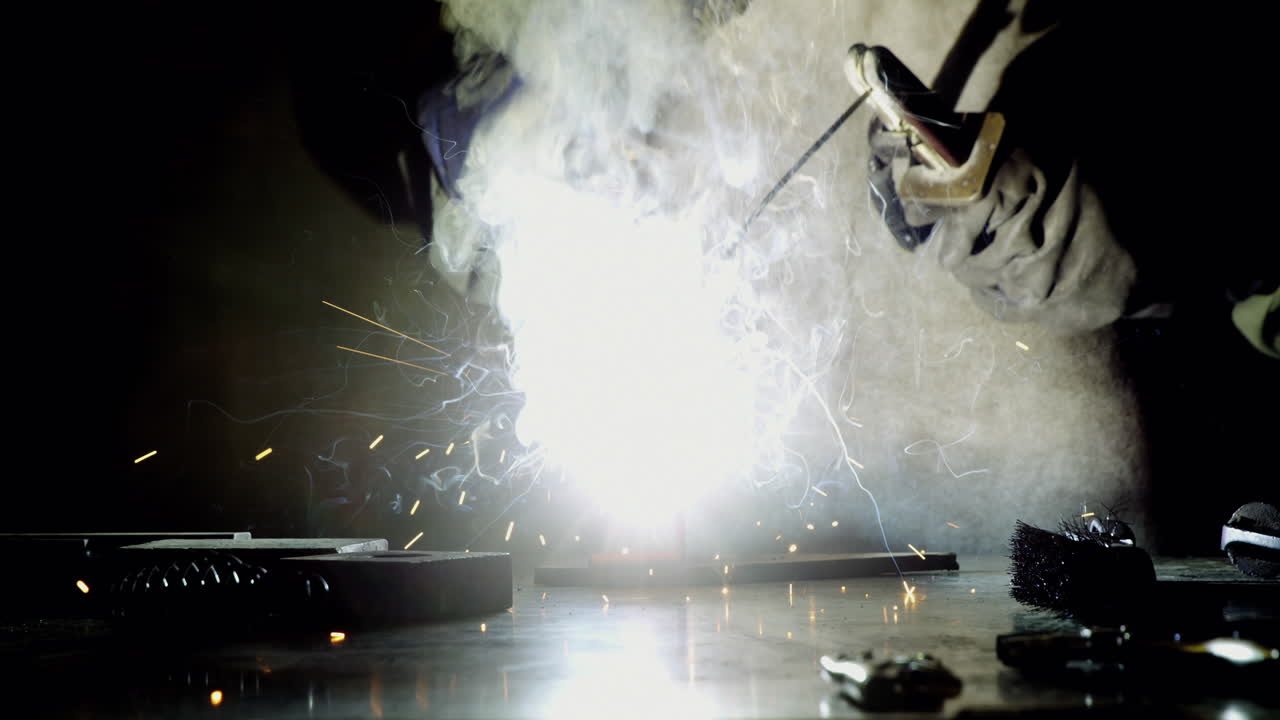 Welder welding a metal
