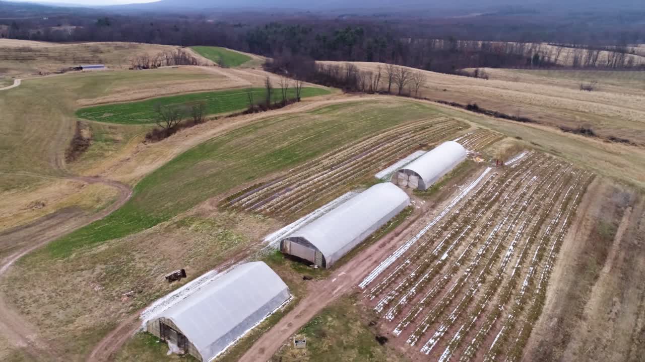 Aerial View of Farm with Greenhouses