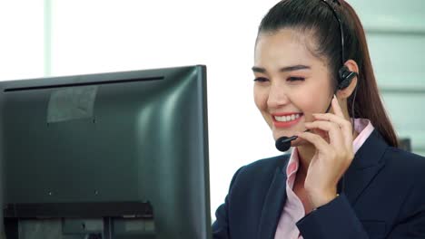 business people wearing headset working in office