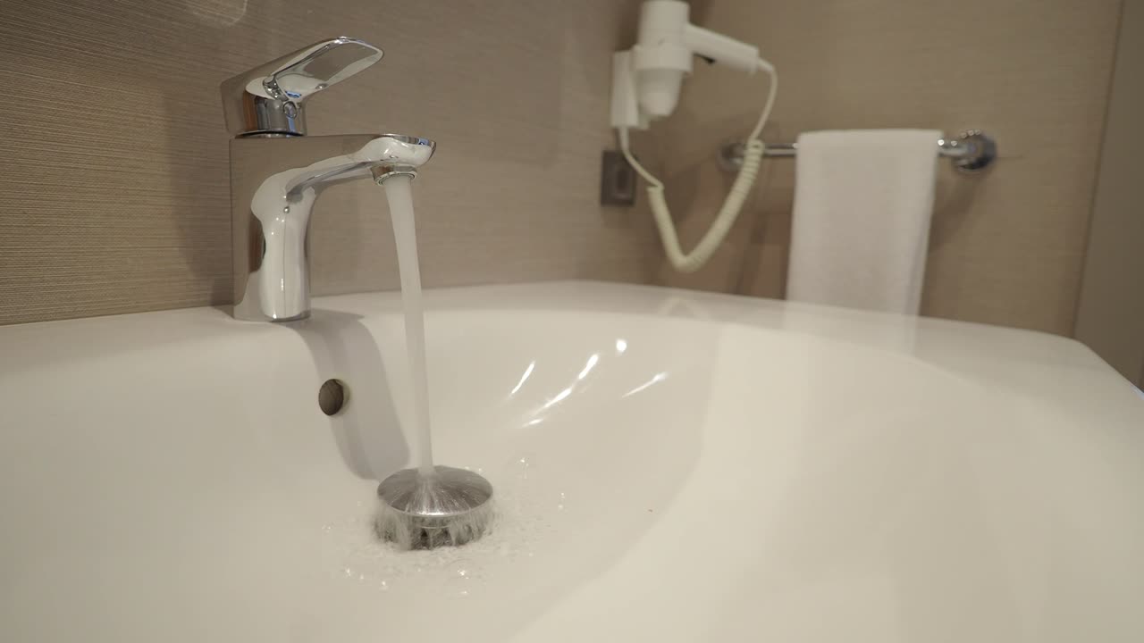 Bathroom Sink with Running Water