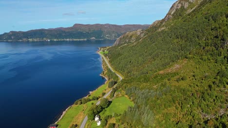 Aerial-over-road-near-Syvdefjorden-in-the-Vanylven-Municipality,-Norway