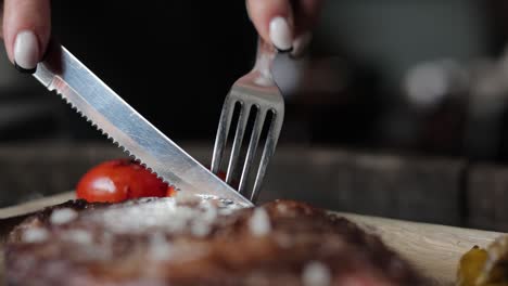 woman eating steak