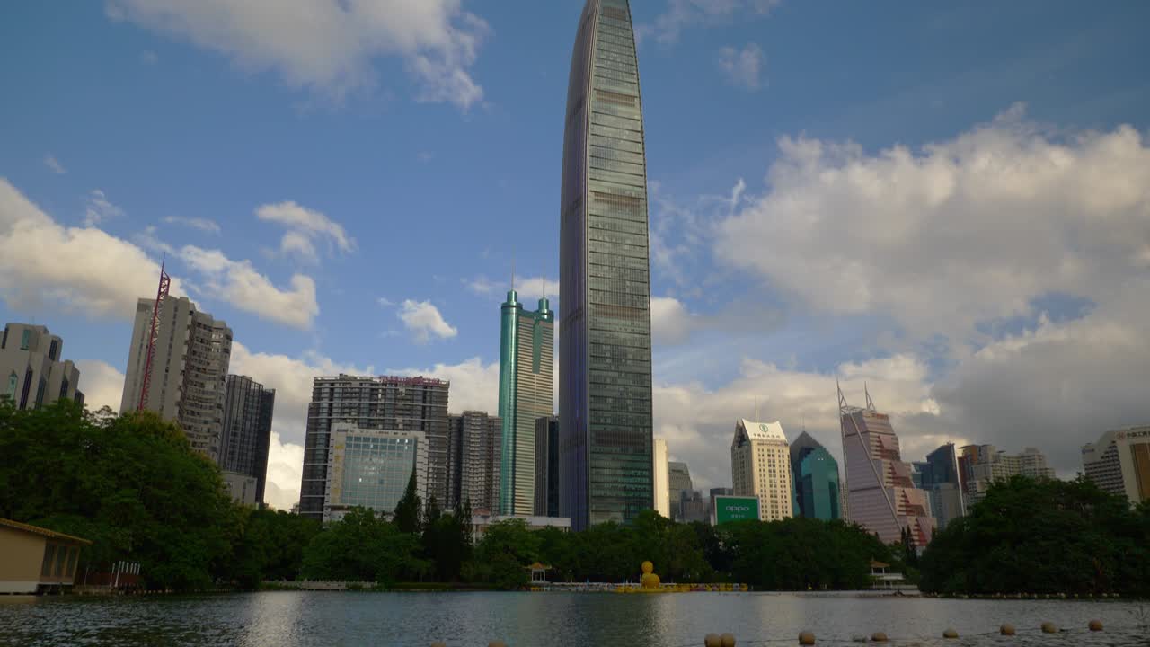 hora del día ciudad de shenzen parque orilla del lago panorama 4k china