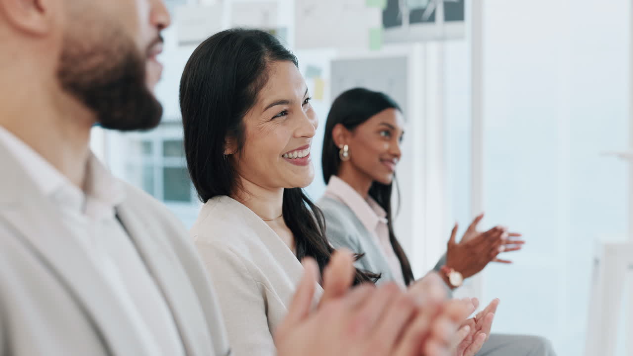 Happy business people, applause