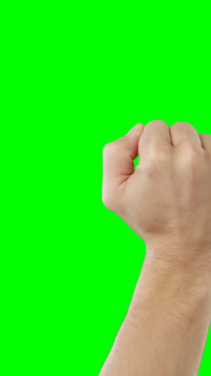 주먹을 들고 있는 남자 손의 클로즈업