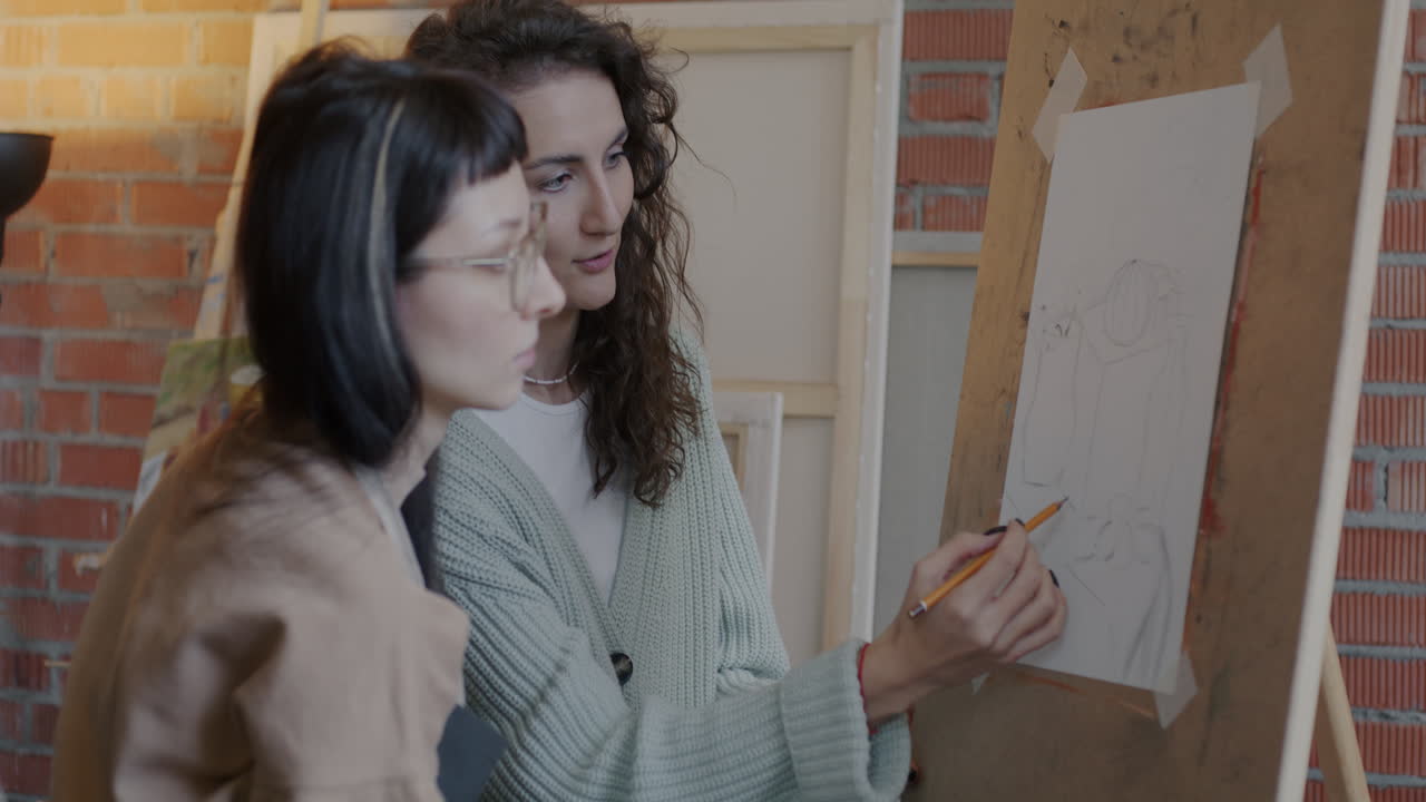 Two Women Learning to Draw Together in an Art Studio