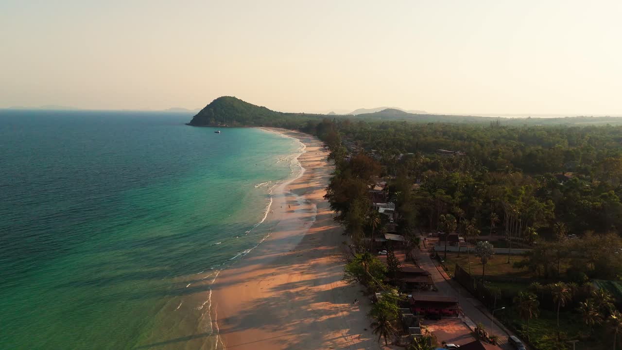Drone Establishing Aerial fly pristine white sand, blue sea beach of Chumphon Thailand landcape, travel destination in southeast asia