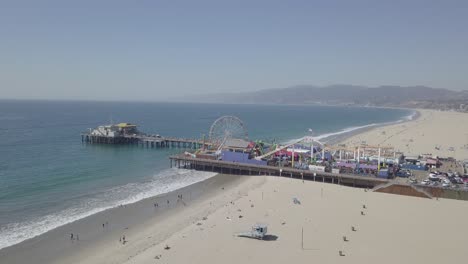 aerial drone shot of venice beach pacific park pier