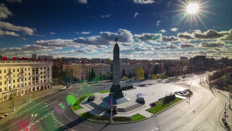 sunny day minsk city victory monument traffic circle rooftop view 4k timelapse belarus