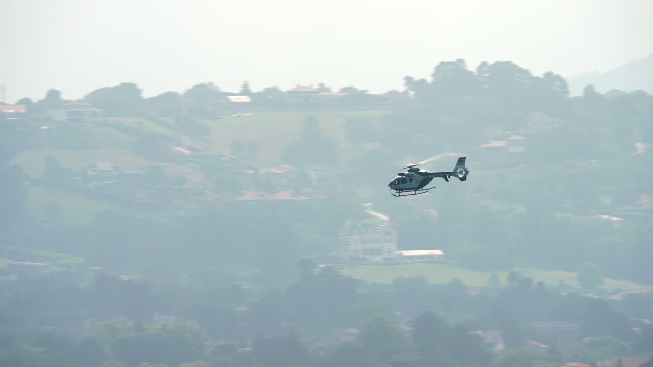 Helicopter flying over a scenic landscape