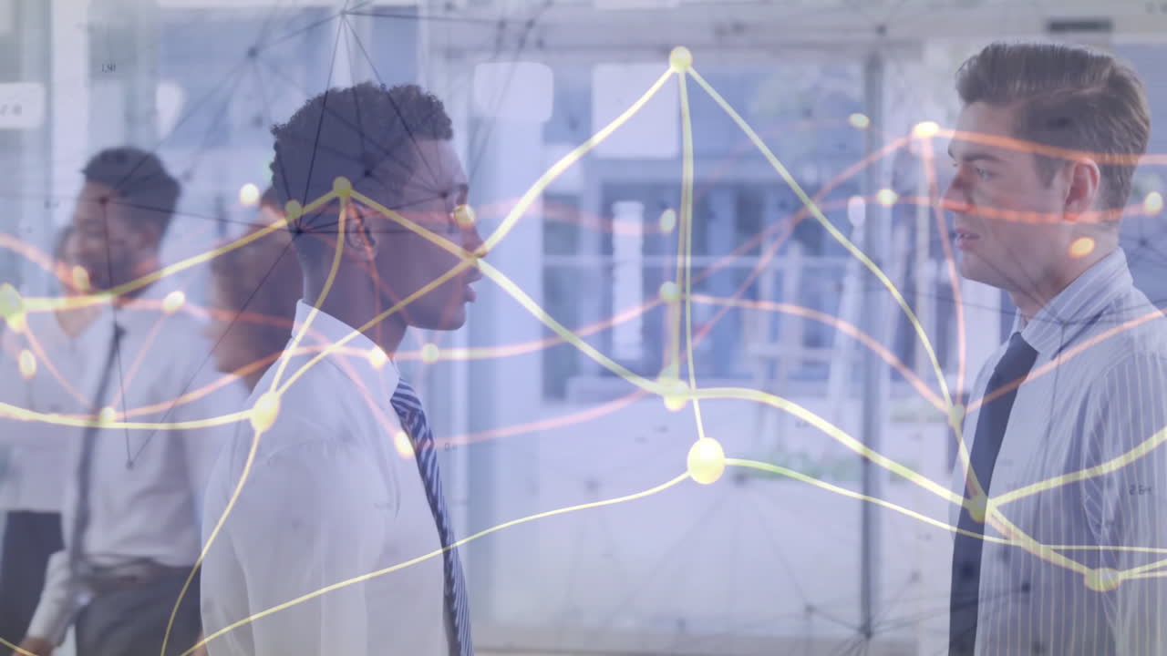 In office, business professionals analyzing data with graphs and animation connections