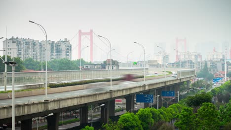 wuhan city day time traffic road junction side famous bridge panorama 4k time lapse china